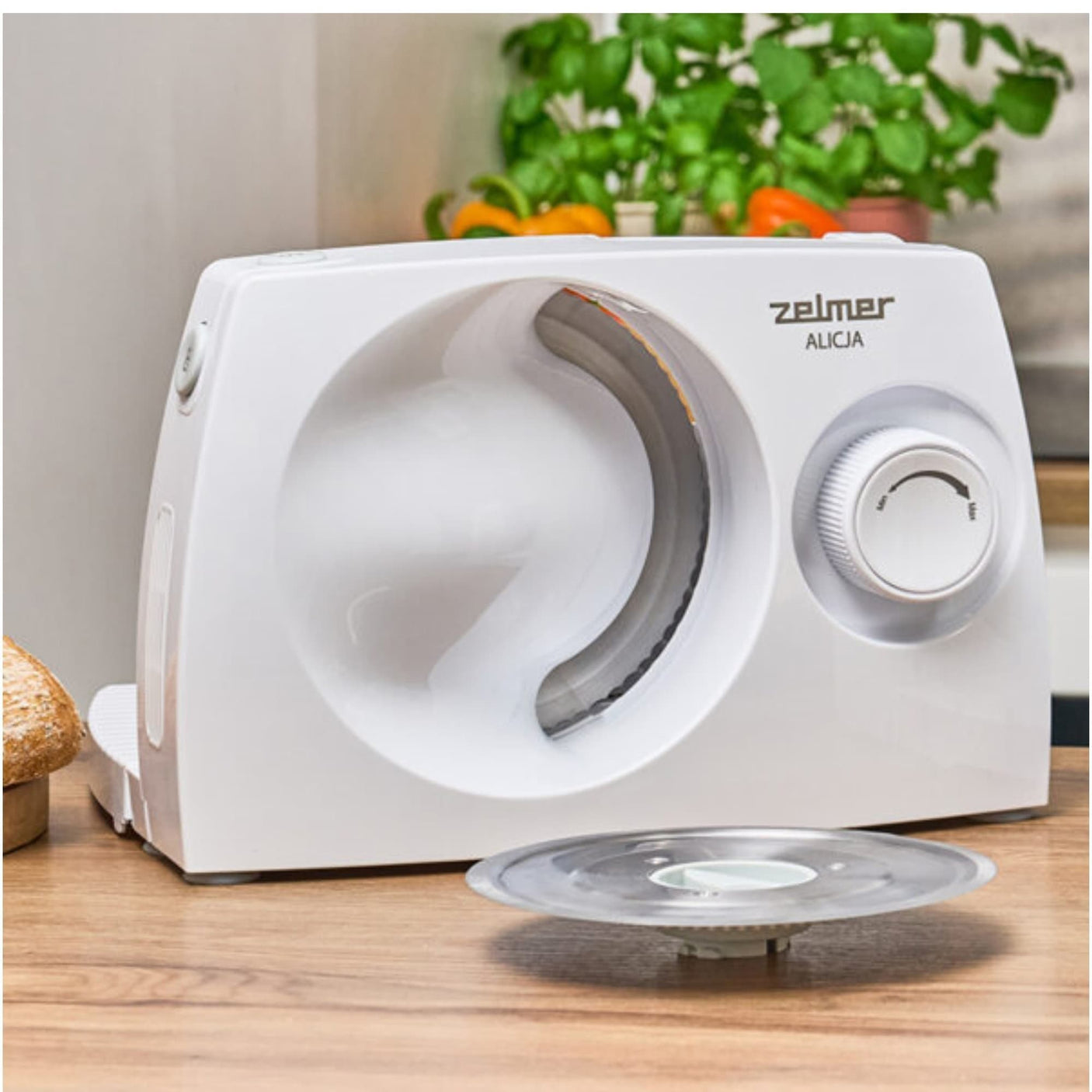 Zelmer Feliator Zelmer, 150W,lama inox 170 mm, lama suplimentara pt alimente mai dure, reglaj grosime, protectie, tava pt alimente, alb