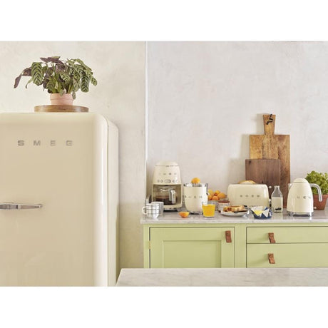 SMEG Prăjitor de pâine SMEG TSF03CREU, 4 felii, design retro anii ’50, funcții decongelare/reîncălzire, crem