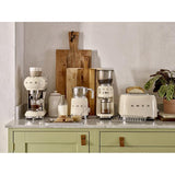 SMEG Prăjitor de pâine SMEG TSF03CREU, 4 felii, design retro anii ’50, funcții decongelare/reîncălzire, crem