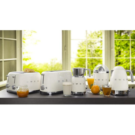 SMEG Prăjitor de pâine SMEG TSF03CREU, 4 felii, design retro anii ’50, funcții decongelare/reîncălzire, crem